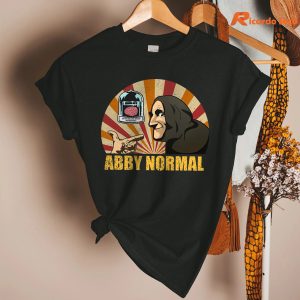 Abby Normal T-shirt hangs on a hanger
