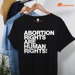Abortion Rights Are Human Rights Cm Punk T-shirt hanging on a hanger