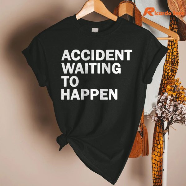 Accident Waiting To Happen T-shirt hangs on a hanger