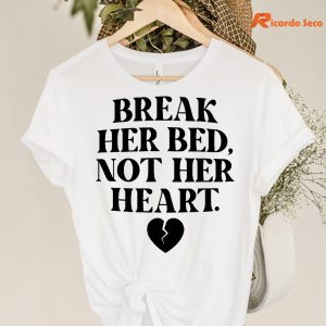 Break Her Bed Not Her Heart T-shirt hanging on a hanger