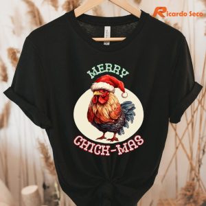 Christmas Chicken T-Shirt hanging on the hanger