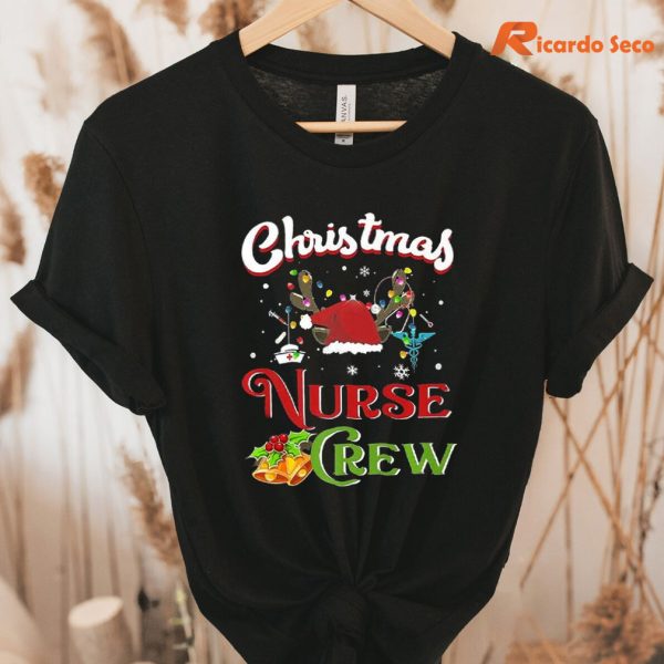 Christmas Nurse Crew T-shirt hanging on the hanger