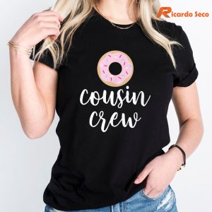 Cousin Crew Pink Donut Christmas T-Shirt is worn on the body