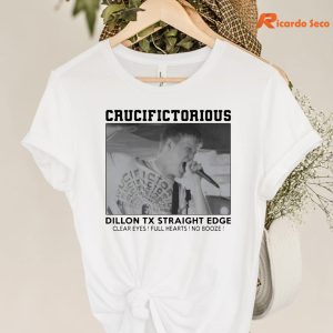 Crucifictorious Dillon T-shirt hanging on a hanger