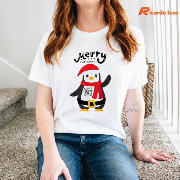 Cute Baby Penguin Merry Christmas T-shirt is worn on the human body