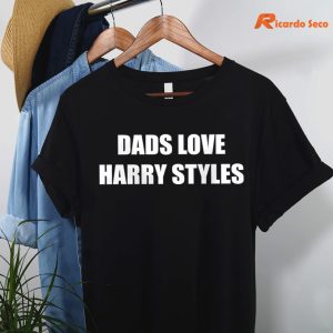 Dad Love Harry Styles T-shirt hanging on a hanger