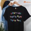 Don’t Let Idiots Ruin Your Day T-shirt hung on a hanger