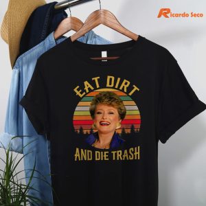 Eat Dirt And Die Trash T-shirt is hanging on a hanger