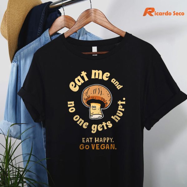 Eat Me And No More One Get Hurt - Mushroom T-shirt is hanging on a hanger