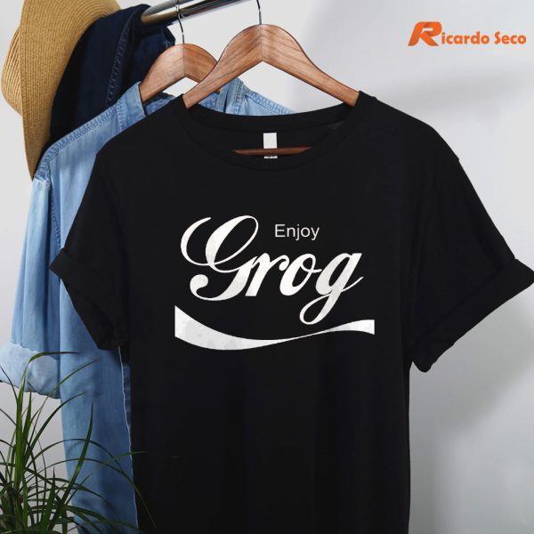 Enjoy Grog T-shirt hanging on a hanger