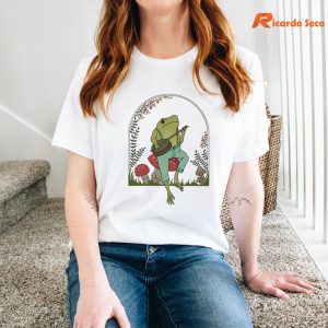 Frog Playing Banjo on Mushroom T-shirt is worn on the human body