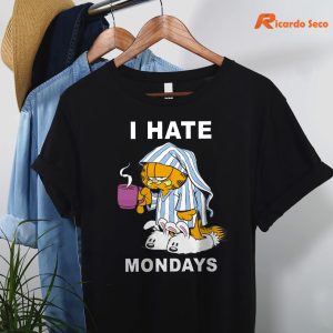 Garfield I Hate Mondays T-shirt are hanging on hangers