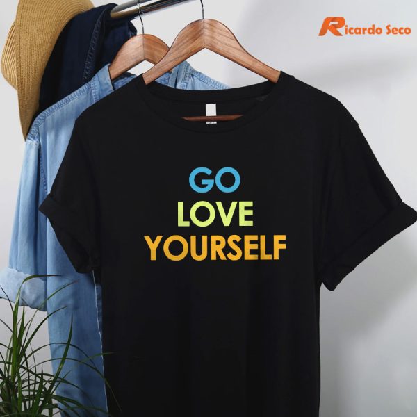 Go Love Yourself T-shirt are hanging on hangers