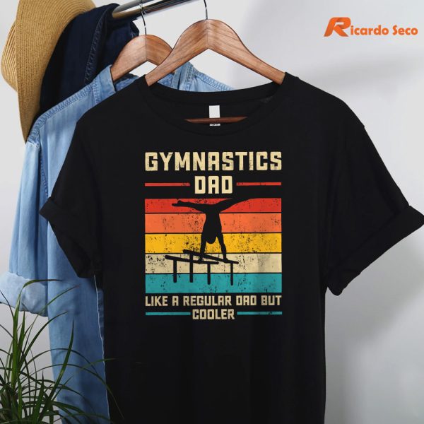 Gymnastics Dad Shirt, Like A Regular Dad But Cooler T-Shirt hanging on a hanger