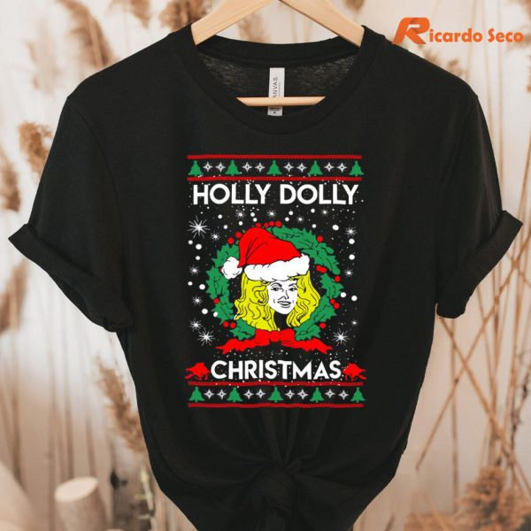 Holly Dolly Christmas T-shirt hung on a hanger
