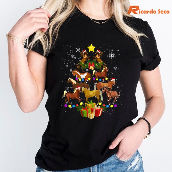 Horses Christmas Tree T-Shirt is being worn on the body