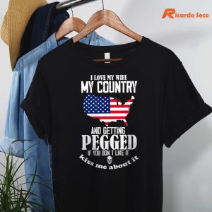I Love My Wife My Country And Getting Pegged If You Don't T-shirt hanging on the hanger