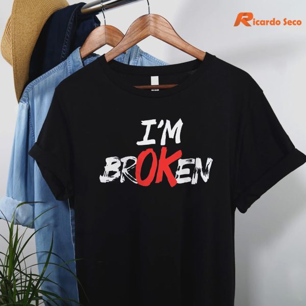 I'm OK Broken T-shirt hanging on the hanger