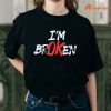 I'm OK Broken T-shirt is being worn on the body