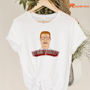 King of the Hill Hank Dammit Bobby T-shirt hanging on a hanger