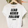 Lead Never Follow Leaders T-shirt hanging on a hanger