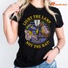 Light The Lamp, Not The Rat The Muppet Christmas Carol T-shirt is worn on the body