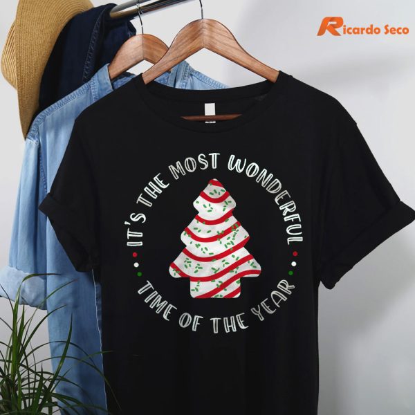 Little Debbie Christmas Tree Cake T-shirt hanging on a hanger
