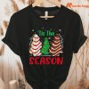 Little Tis' The Season Christmas Tree T-shirt hanging on a hanger