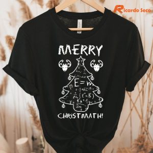 Merry Christmath T-shirt hanging on the hanger