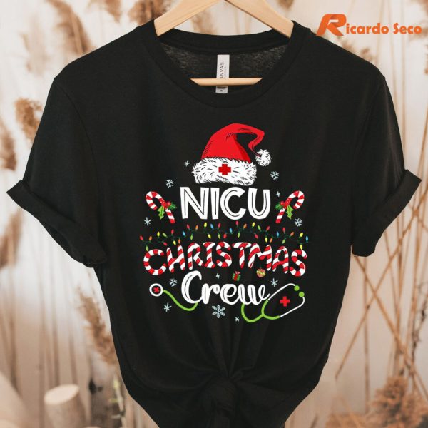 NICU Christmas Crew T-Shirt hanging on a hanger