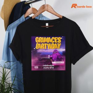 Official Grimace’s Birthday T-shirt is hanging on the hanger