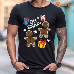 Oh Snap! Gingerbread Man & Presents Specialty Soft Hand T-shirt is being worn on the body