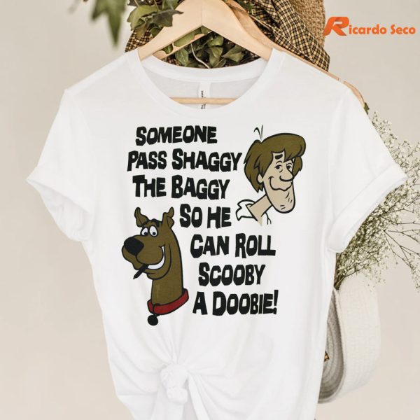 Pass Shaggy the Baggy so he Can Roll Scooby a Doobie T-shirt hanging on the hanger