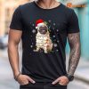 Pug Christmas Tree Light Pajama Dog X-mas T-shirt is being worn on the body