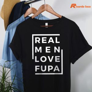 Real Men Love Fupa T-shirt are hanging on hangers