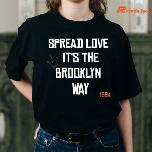 Spread Love It's The Brooklyn Way T Shirt is being worn on the body