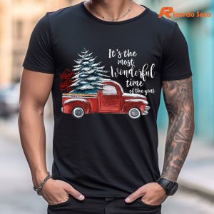 The Most Wonderful Time Christmas Truck T-shirt is being worn on the body