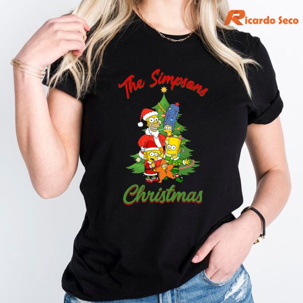 The Simpsons Family Christmas Tree Holiday T shirt is worn on the body