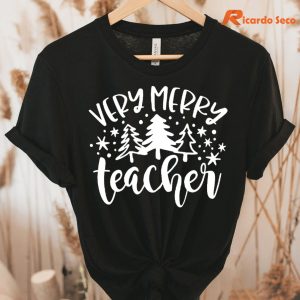 Very Merry Teacher Christmas T-shirt hanging on the hanger