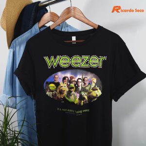 Weezer It’s Not Easy Being Weez 2002 Muppets Band T-shirt hanging on the hanger