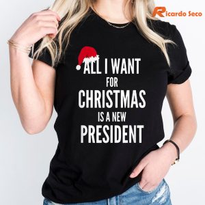 All I Want For Christmas Is A New President Santa Hat Tshirt is worn on the human body