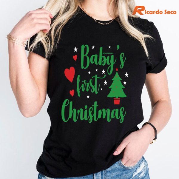 Celebrate Baby's First Christmas T-shirt is worn on the body