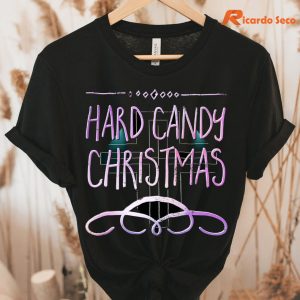 Hard Candy Christmas Christmas T-shirt hung on a hanger