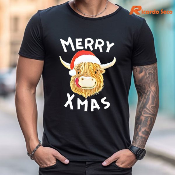 Highland Cow Christmas T-shirt is worn on the human body